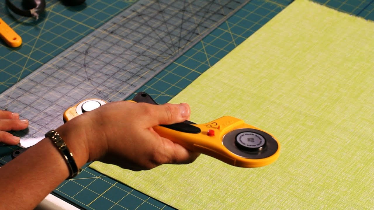 Rotary cutter vs. scissors: a friendly sewing tool fight