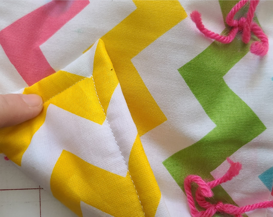 Quilting 101: How to Bind a Quilt with the Backing
