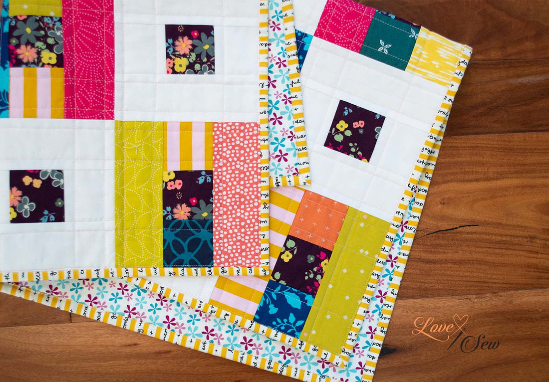 Scrappy Baby Quilt free pattern with video instructions by Love Sew